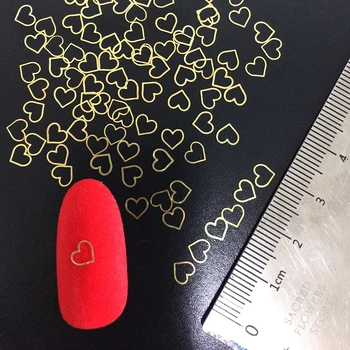 Yeni Tırnak Tasarımları Hollow Kalp 100 adet 3D Tırnak Çıkartmalar Alaşım Tırnak Sanat Perçin Altın Metalik Çiviler Tırnak Aksesuarları Dekorasyon